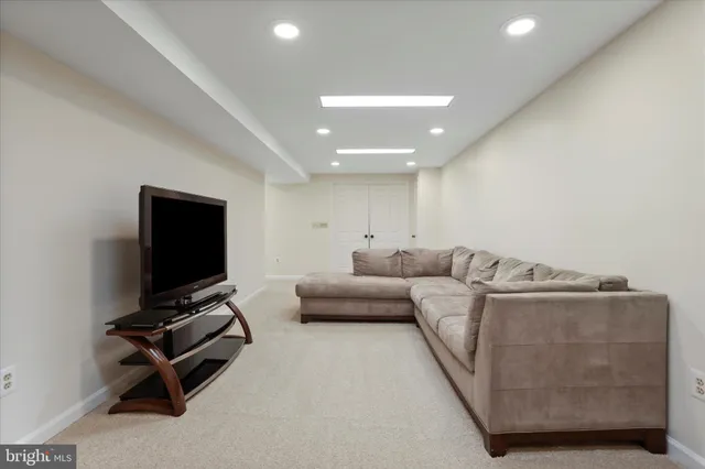 a view of a balcony with wooden floor and fence