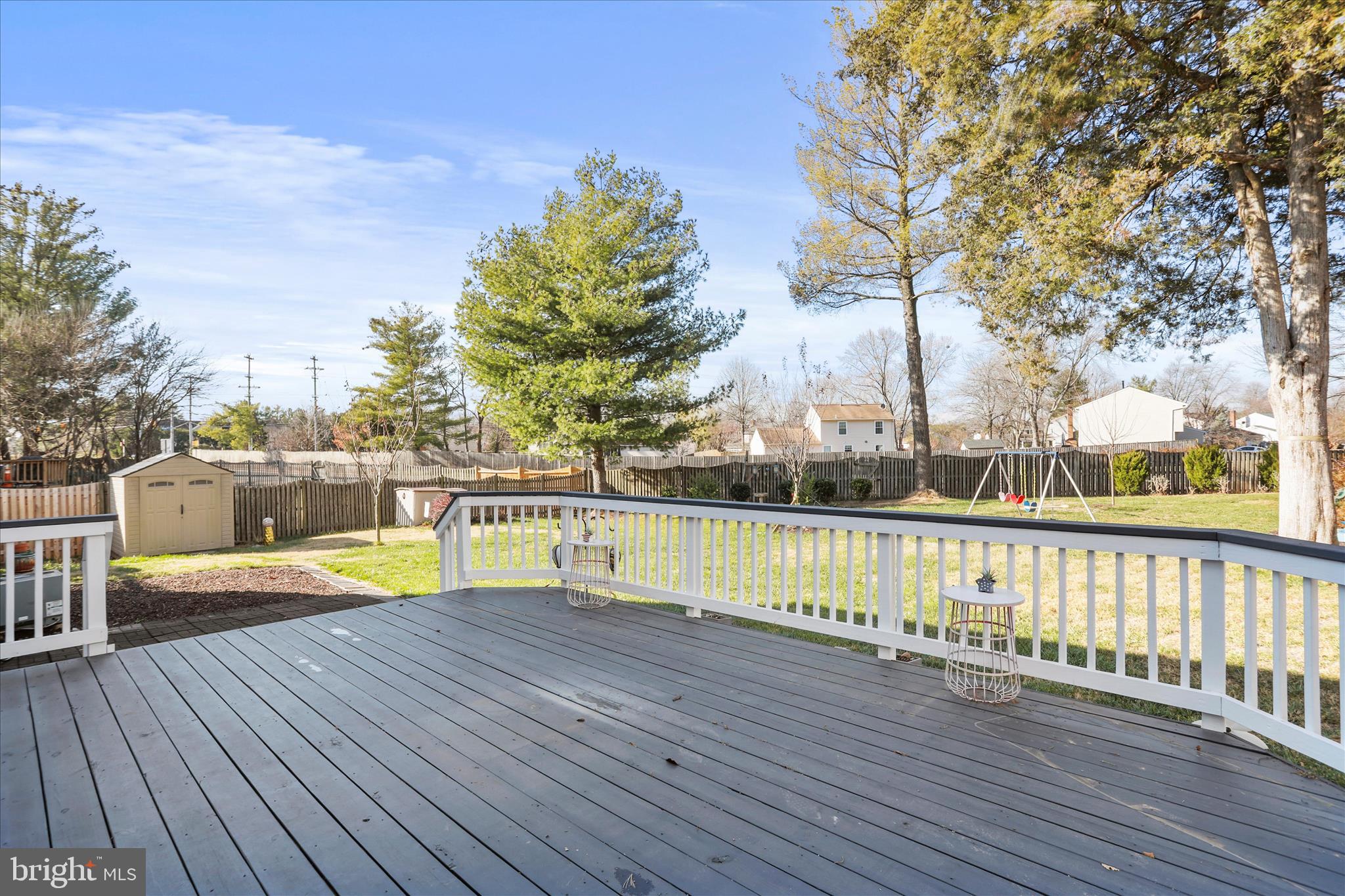 5435 Tree Line Drive Centreville, VA 20120 - Photo 43 of 51 a view of a balcony with wooden floor and fence