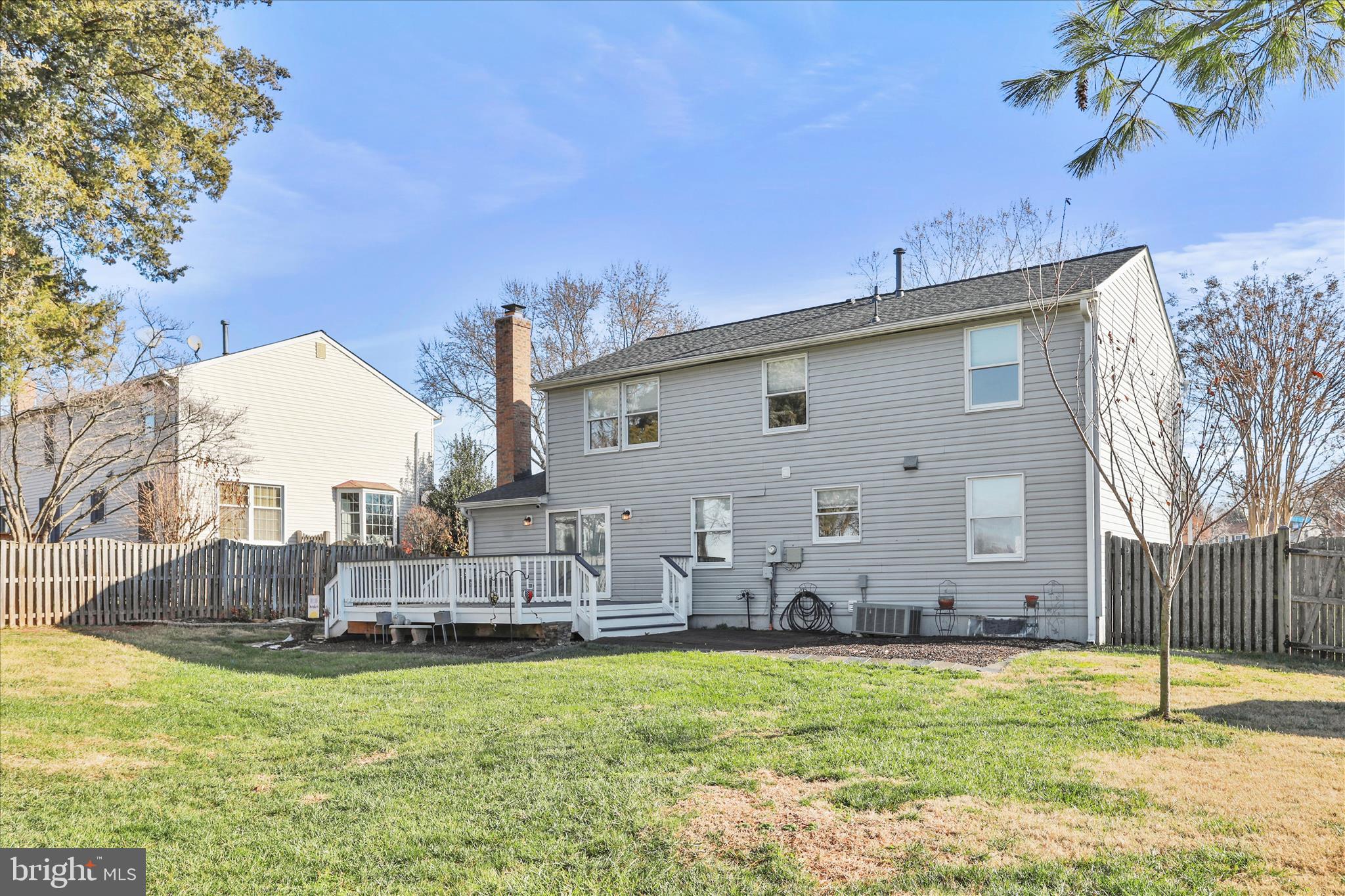 5435 Tree Line Drive Centreville, VA 20120 - Photo 45 of 51 a view of a house with backyard and sitting area