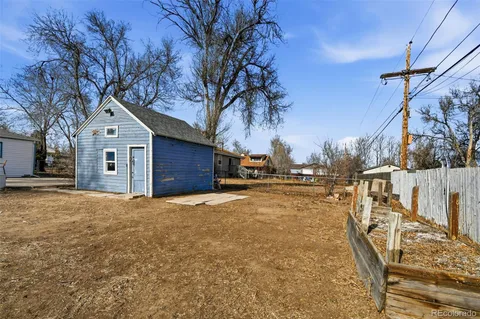 a view of road with large trees