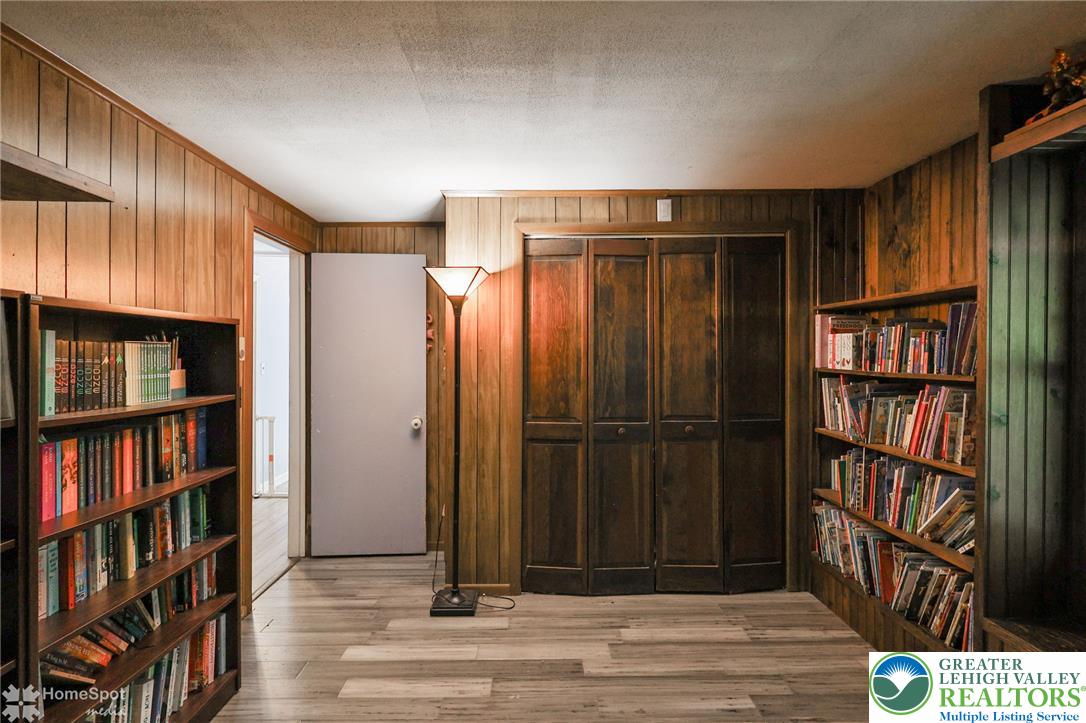 60 Sassafras Road Lehighton, PA 18235 - Photo 30 of 36 A cozy retreat offering abundant built-in storage and warm wood paneling.