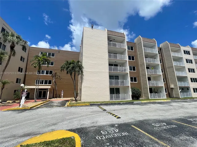 a building with trees in front of it
