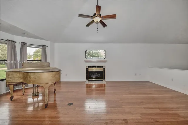 a room with furniture and a chandelier