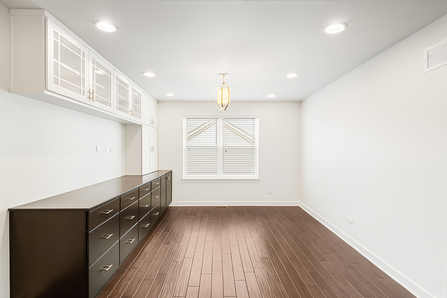 1002 Hudson Drive Joliet, IL 60431 - Photo 23 of 40 a view of hallway with wooden floor and staircase