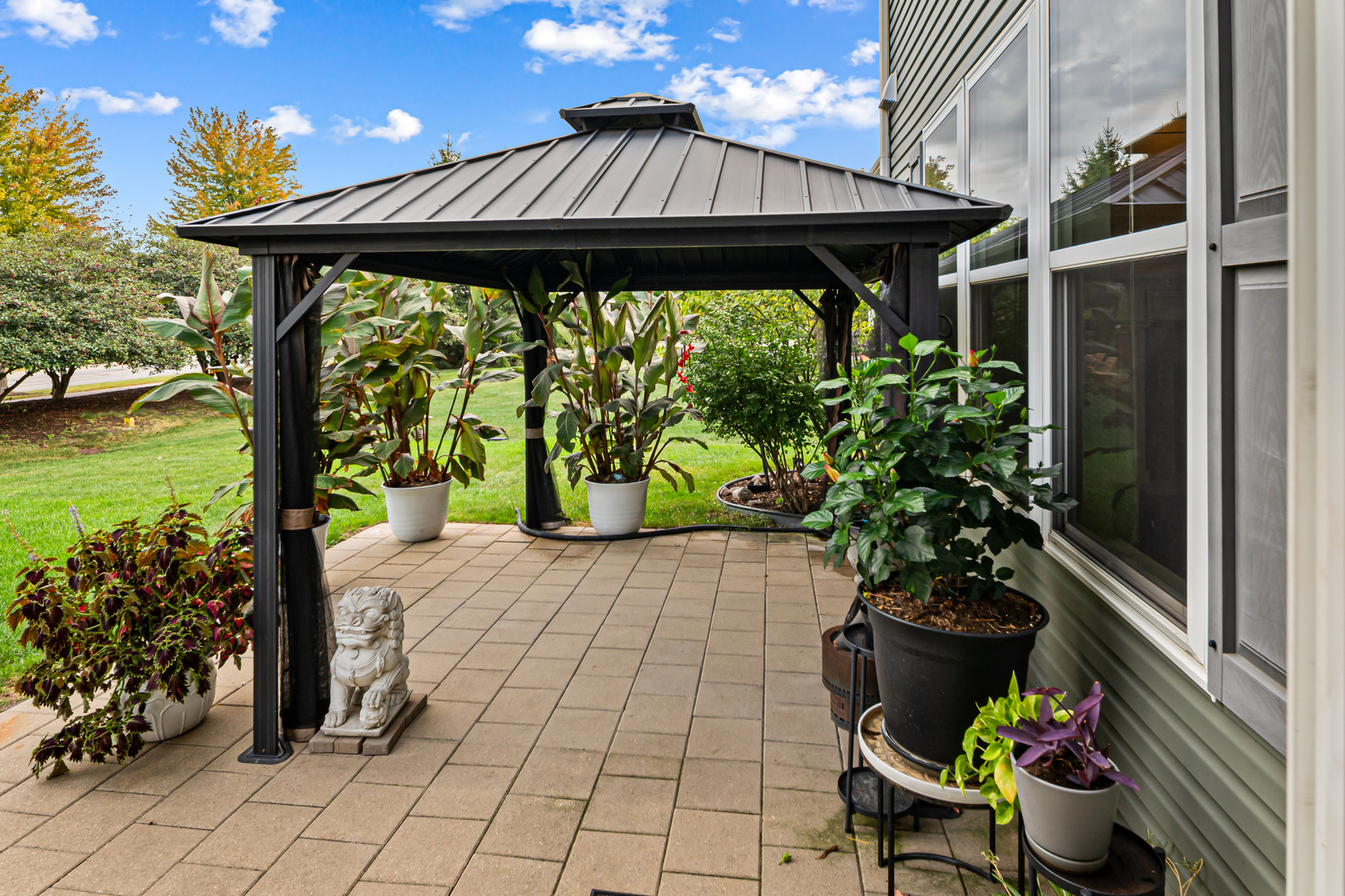 1002 Hudson Drive Joliet, IL 60431 - Photo 31 of 40 a front view of a house with swing seating