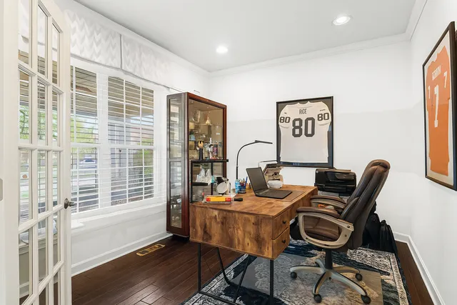 a work room with furniture and windows