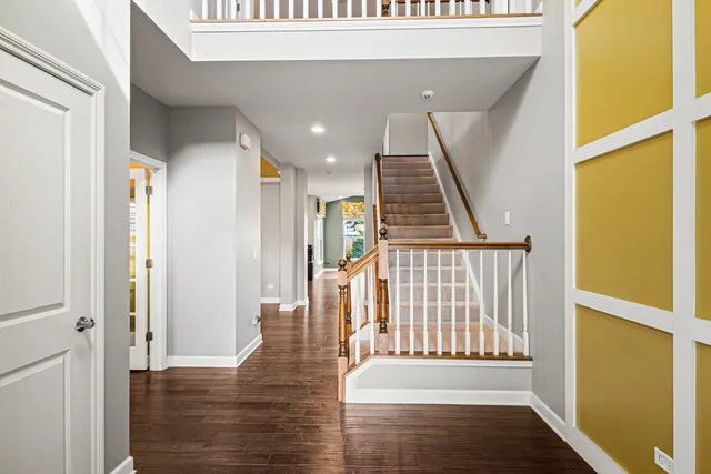 a view of entryway with wooden floor