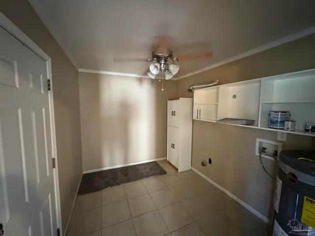 a view of a kitchen with a refrigerator and microwave