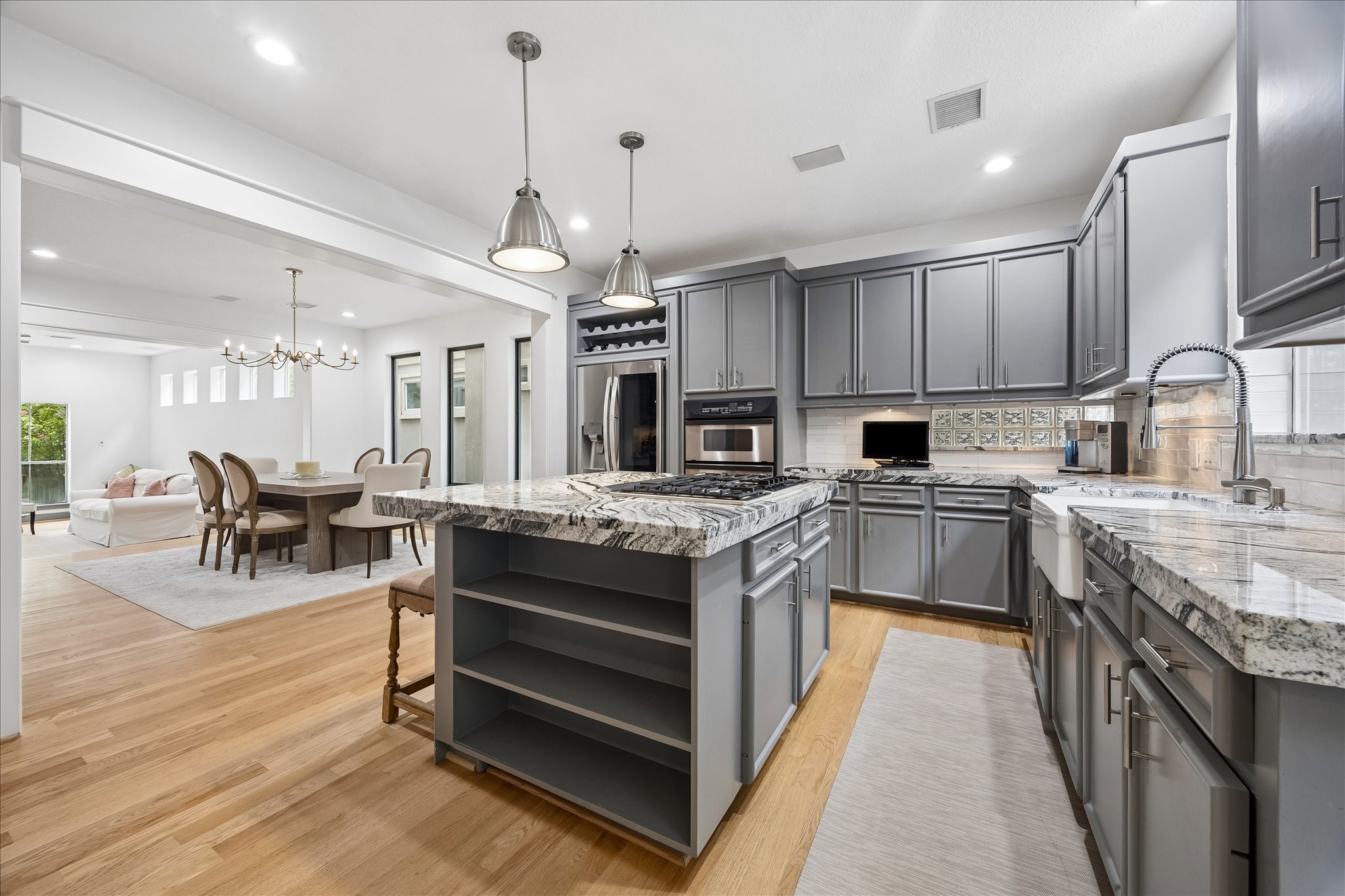 6406 Rodrigo Street, Unit B Houston, TX 77007 - Photo 12 of 27 Kitchen is open to the dining and living rooms for ease of entertaining.