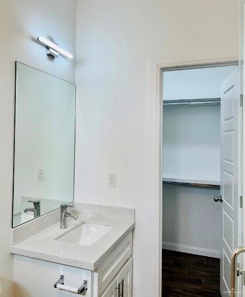 7006 North 56th Lane Mission, TX 78573 - Photo 12 of 14 a bathroom with a sink and a mirror