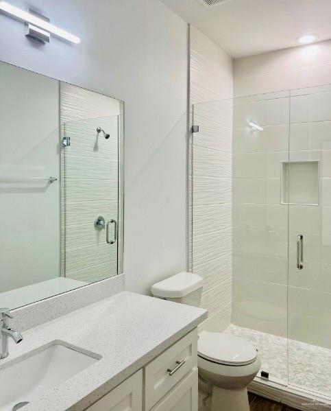 7006 North 56th Lane Mission, TX 78573 - Photo 9 of 14 a bathroom with a sink toilet and shower
