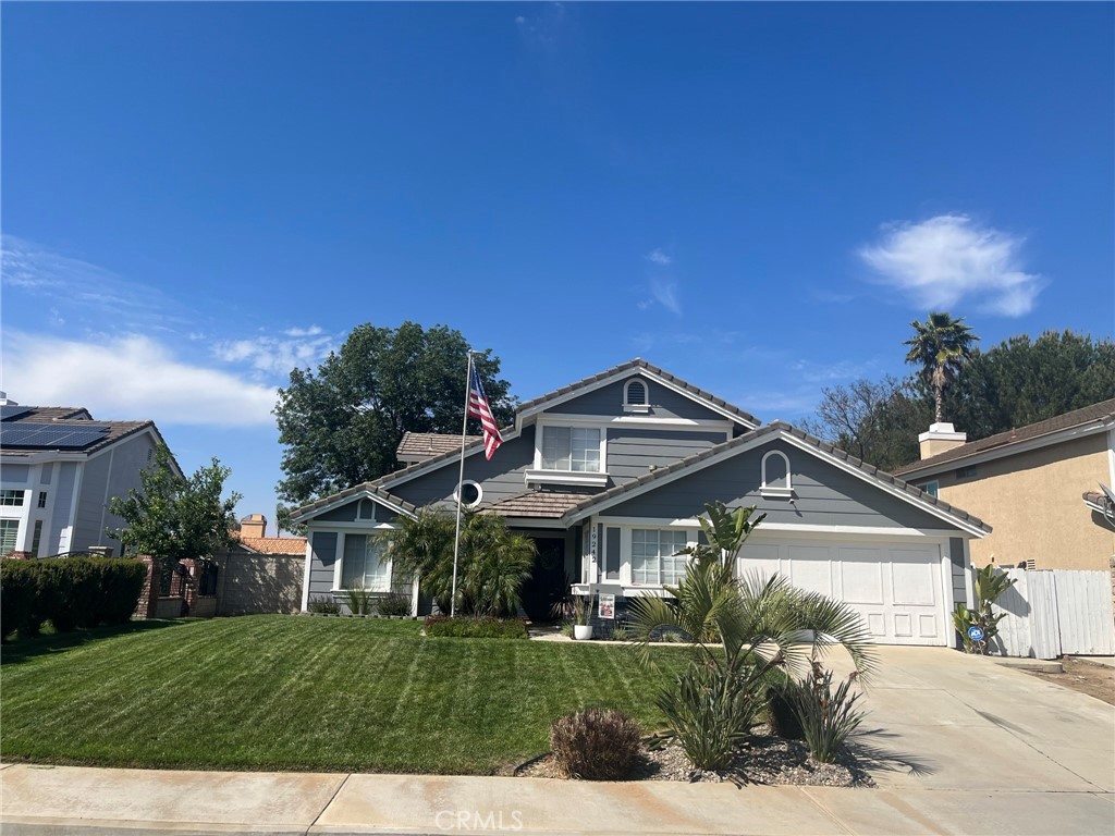 19242 Hillward Court Riverside, CA 92508 - Photo 1 of 1 a front view of a house with a yard