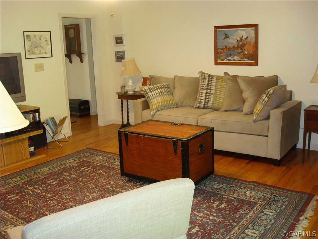 2117 Moseley Road Moseley, VA 23120 - Photo 16 of 39 a living room with furniture and a rug