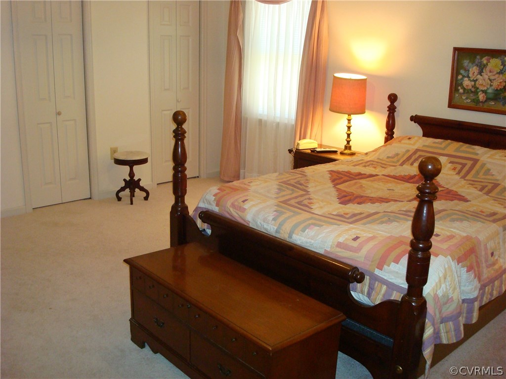 2117 Moseley Road Moseley, VA 23120 - Photo 26 of 39 a bedroom with a bed and window