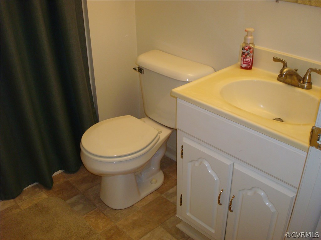 2117 Moseley Road Moseley, VA 23120 - Photo 32 of 39 a bathroom with a sink and a toilet