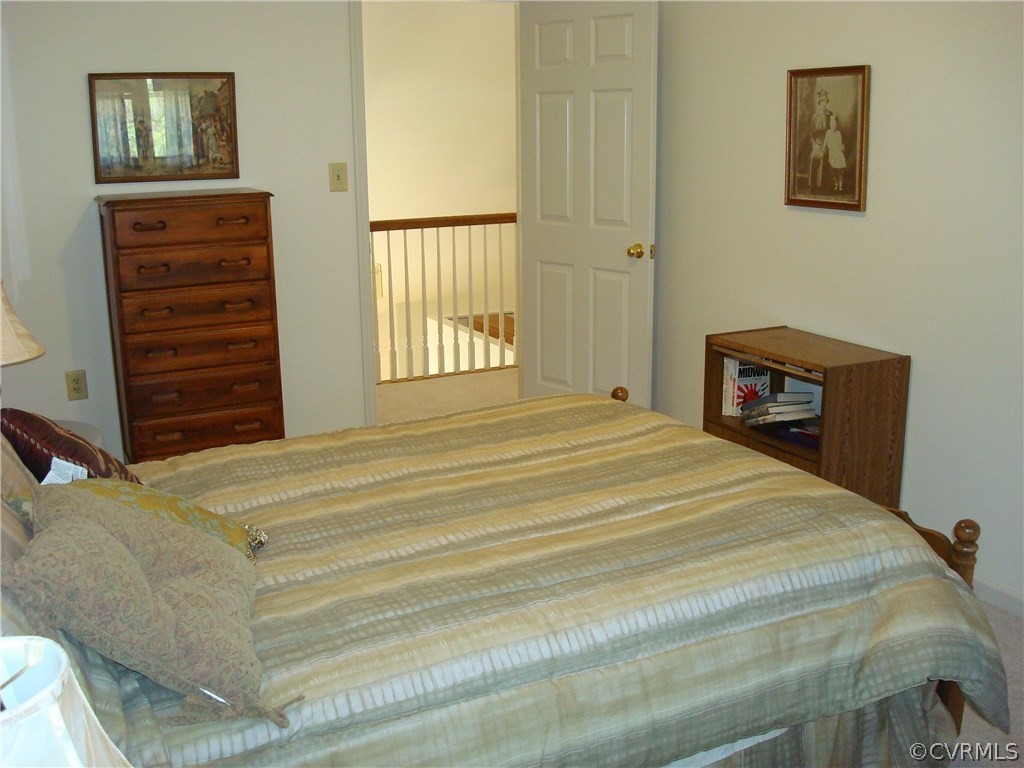 2117 Moseley Road Moseley, VA 23120 - Photo 38 of 39 a bedroom with a bed and a window