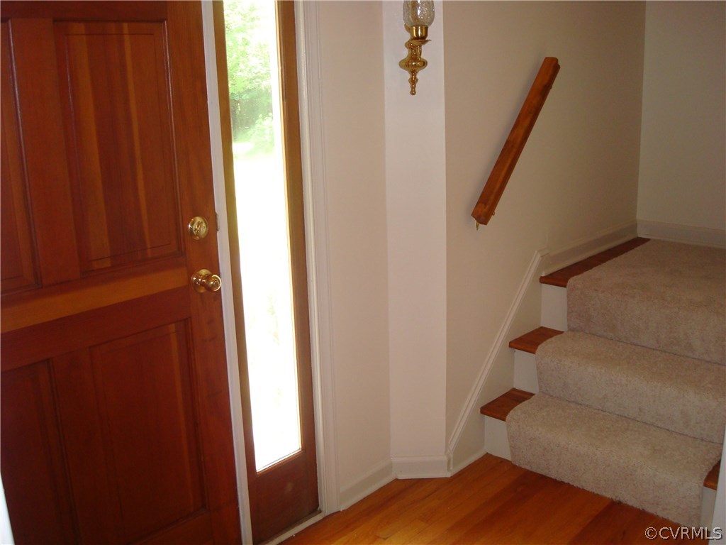 2117 Moseley Road Moseley, VA 23120 - Photo 8 of 39 a view of entryway with wooden floor