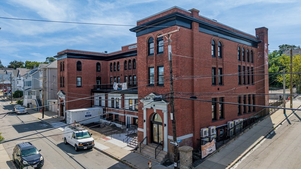 a front view of a house with glass windows