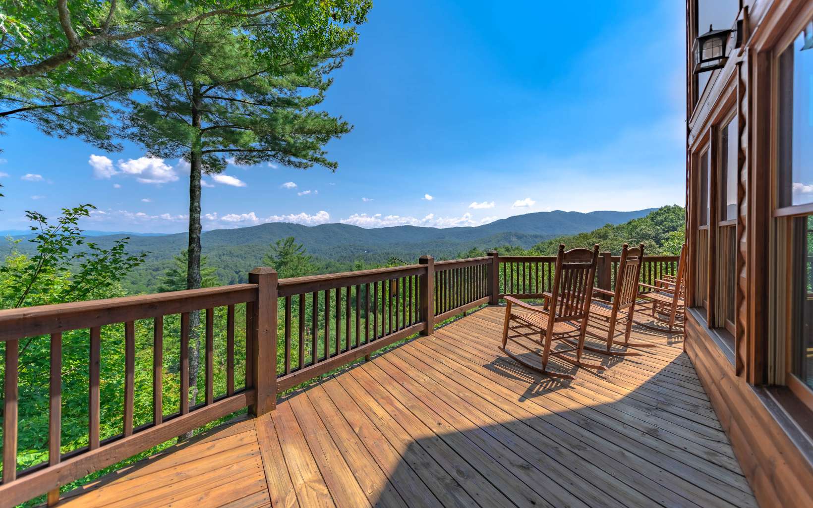 108 Sundance Ridge Epworth, GA 30541 - Photo 1 of 4 a view of balcony with chairs and wooden fence