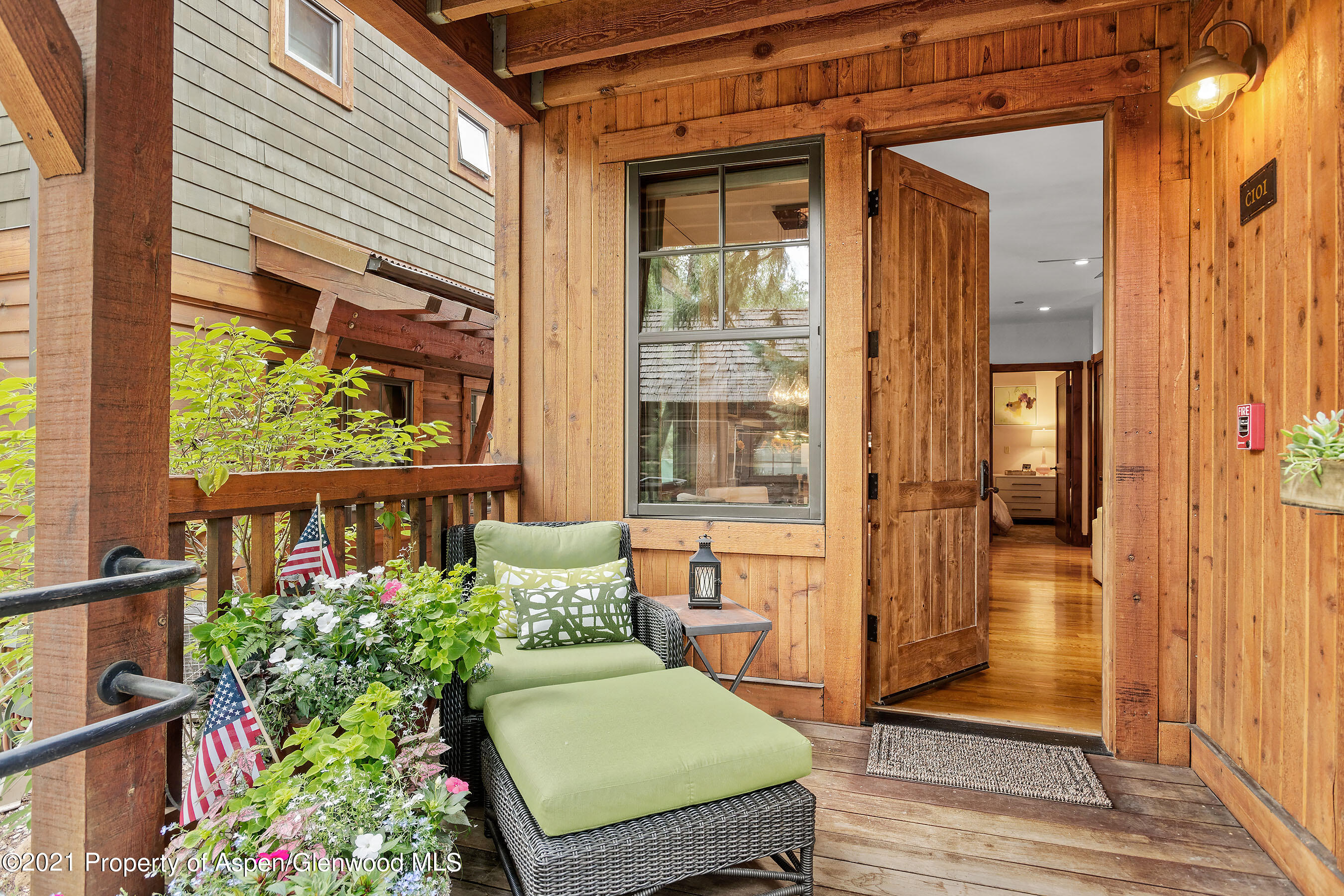 507 West Main Street, Unit C101 Aspen, CO 81611 - Photo 12 of 16 a view of a porch with furniture and garden