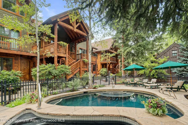 a view of outdoor space with swimming pool and patio
