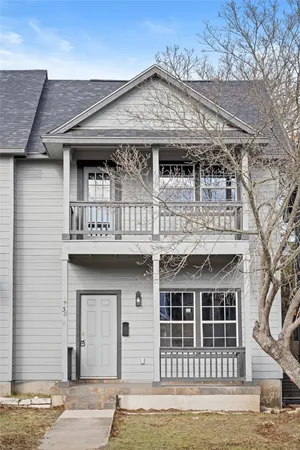 a front view of a house with a garage
