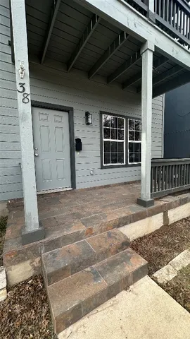 a front view of a house with a garage