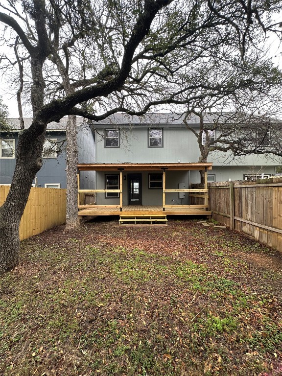 38 Deer Ridge Road Wimberley, TX 78676 - Photo 26 of 26 a front view of a house with a yard