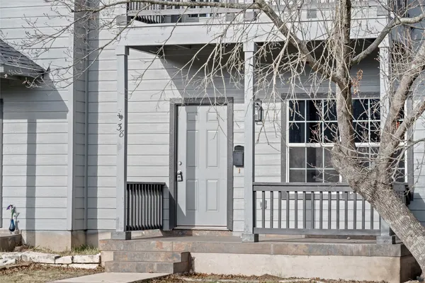 a view of a house with a street