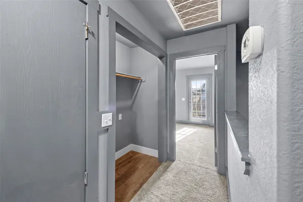 a view of balcony with wooden floor