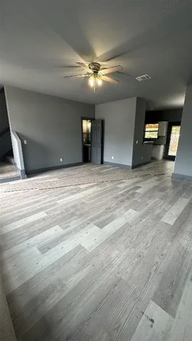 a view of a livingroom with a staircase