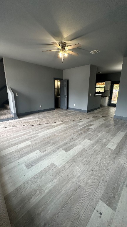 38 Deer Ridge Road Wimberley, TX 78676 - Photo 4 of 26 a view of a livingroom with a staircase