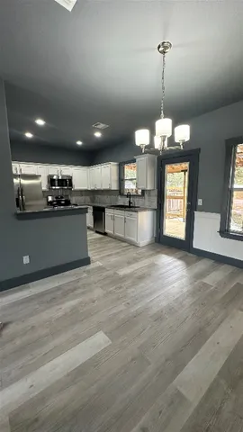 a view of a kitchen and a sink