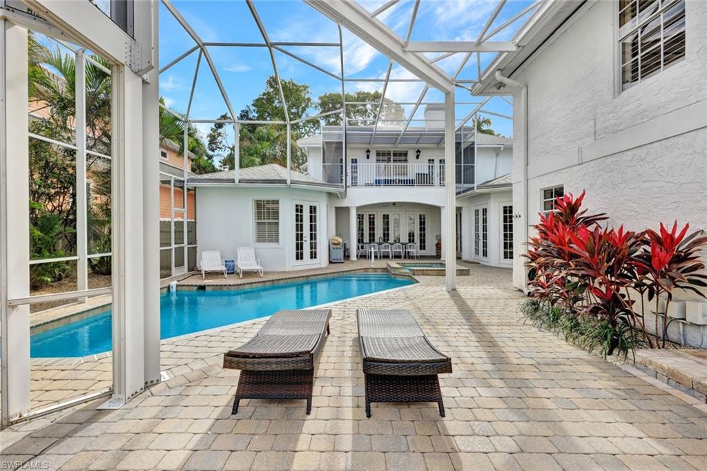 255 2nd Avenue North Naples, FL 34102 - Photo 31 of 32 a view of a house with backyard