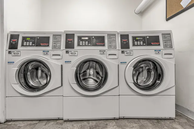 a view of entryway with washer and dryer
