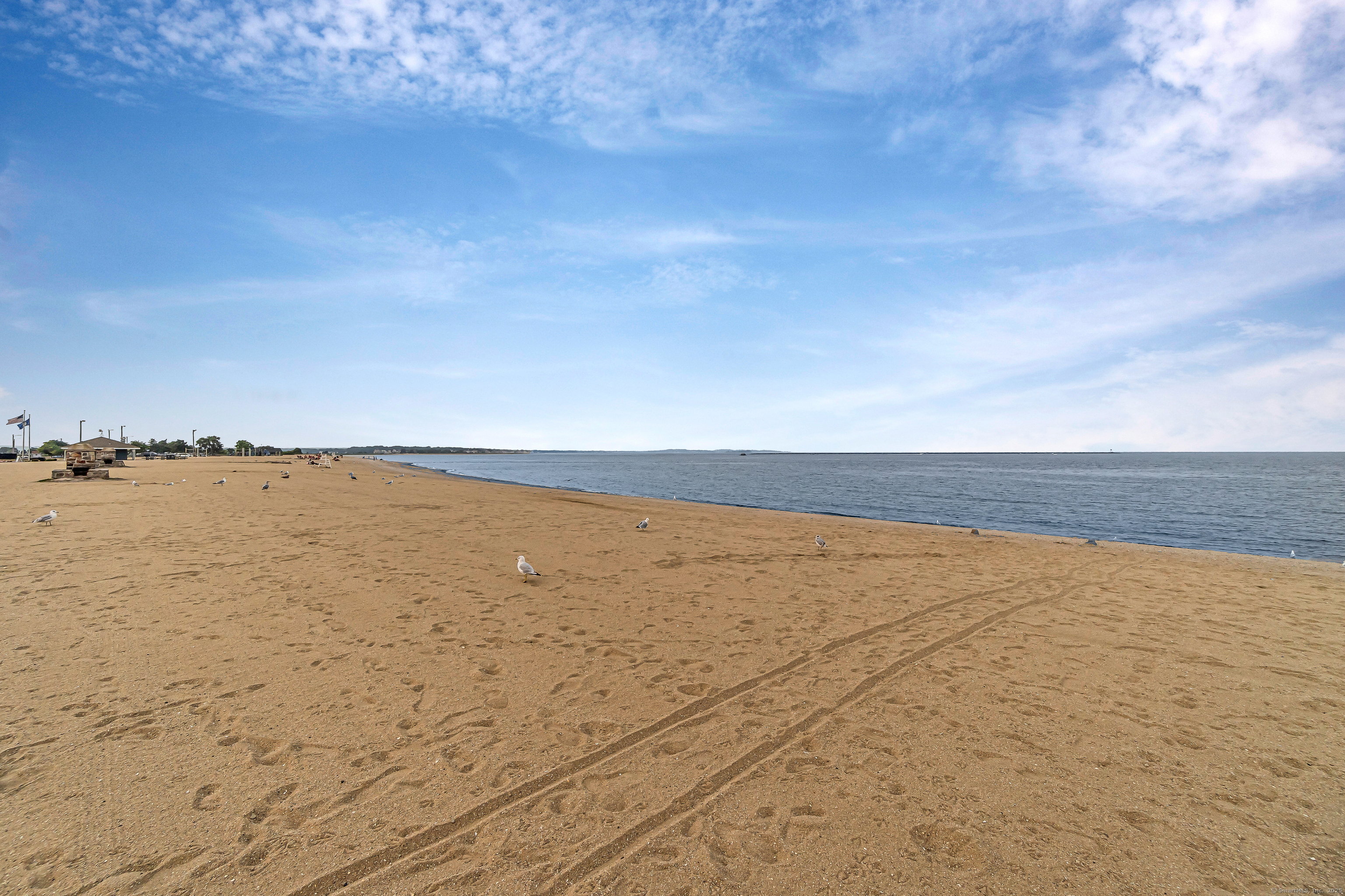 115 Short Beach Road, Unit 103 Stratford, CT 06615 - Photo 2 of 18 a view of an ocean beach