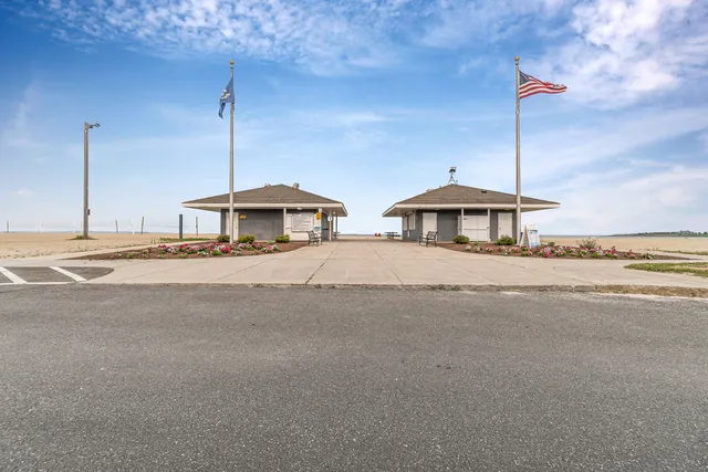 a view of a house with a ocean from balcony