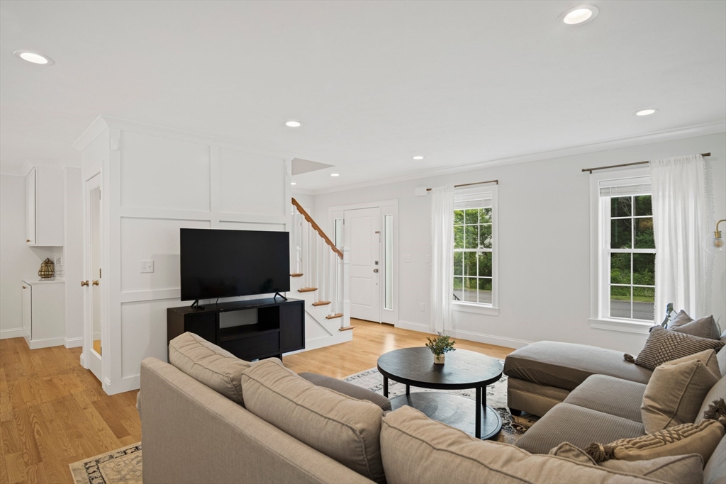 6 Sandy Pond Road Ayer, MA 01432 - Photo 13 of 37 a living room with furniture and a flat screen tv