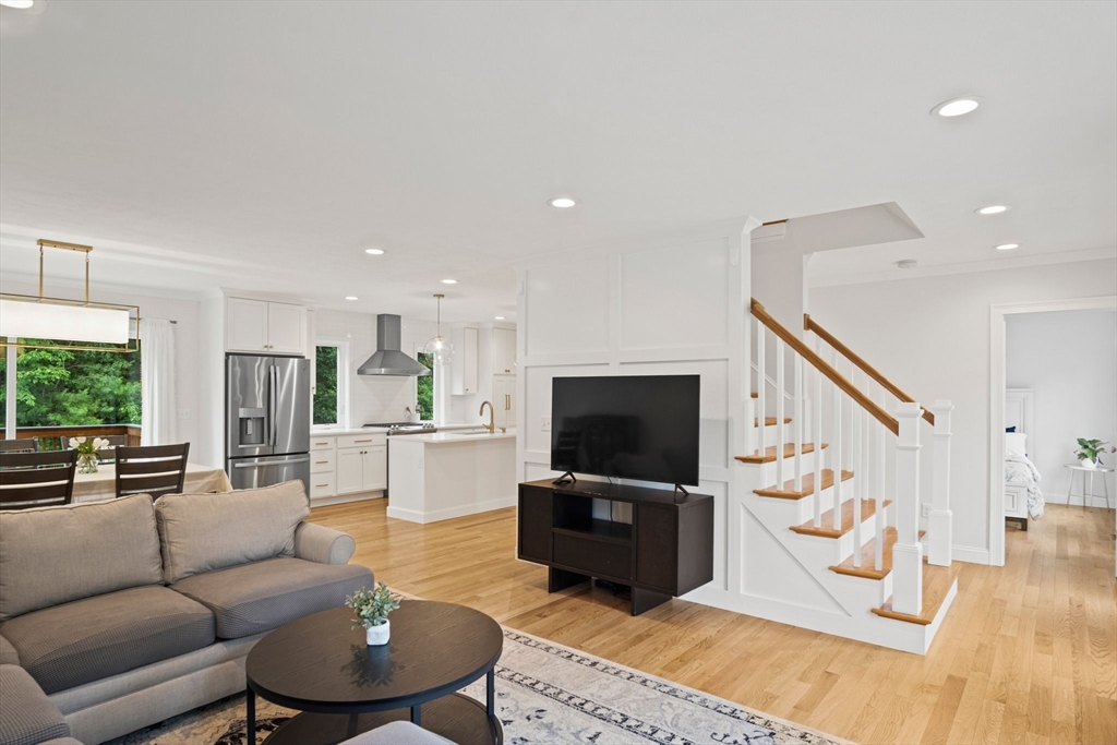 6 Sandy Pond Road Ayer, MA 01432 - Photo 15 of 37 a living room with furniture and a flat screen tv