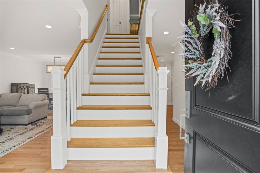6 Sandy Pond Road Ayer, MA 01432 - Photo 17 of 37 a view of entryway and hall with wooden floor