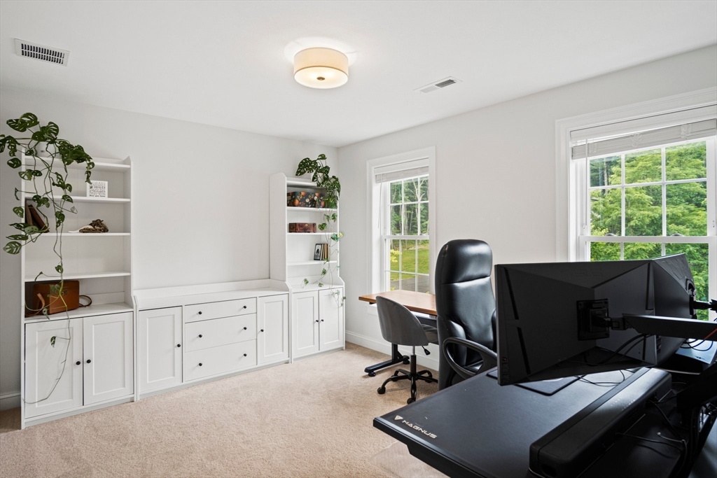6 Sandy Pond Road Ayer, MA 01432 - Photo 26 of 37 a view of a workspace with furniture and a window