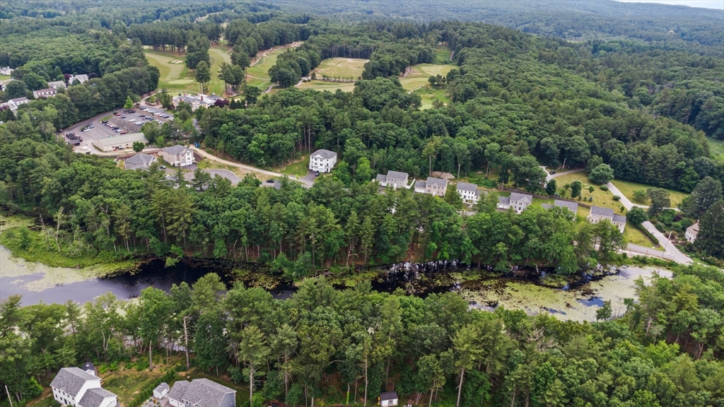 6 Sandy Pond Road Ayer, MA 01432 - Photo 35 of 37 an aerial view of a house with a yard