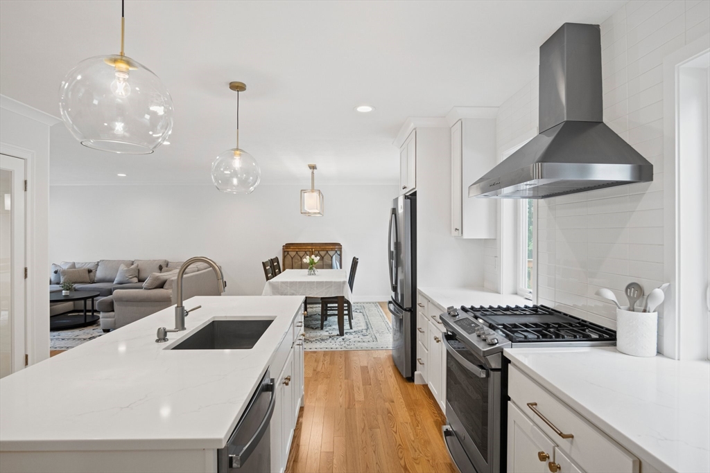 6 Sandy Pond Road Ayer, MA 01432 - Photo 9 of 37 a kitchen with a stove a refrigerator and a sink