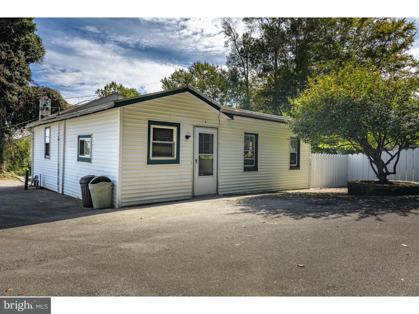 35 State Road Avondale, PA 19311 - Photo 3 of 25 a view of a house with a yard