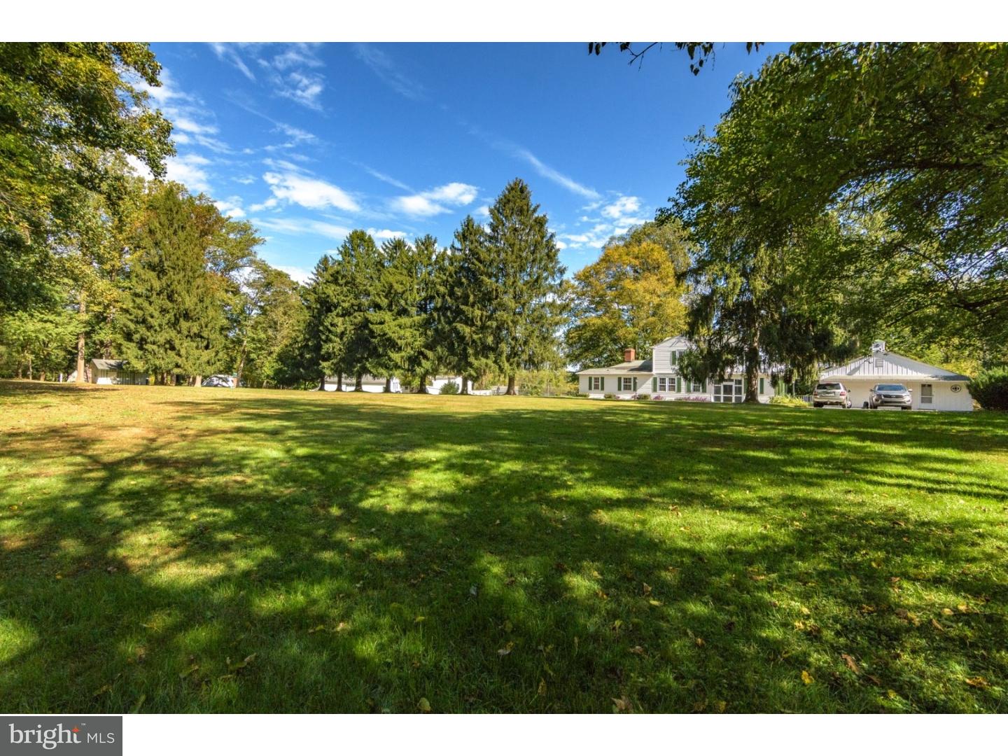 35 State Road Avondale, PA 19311 - Photo 21 of 25 a backyard of a house with lots of green space