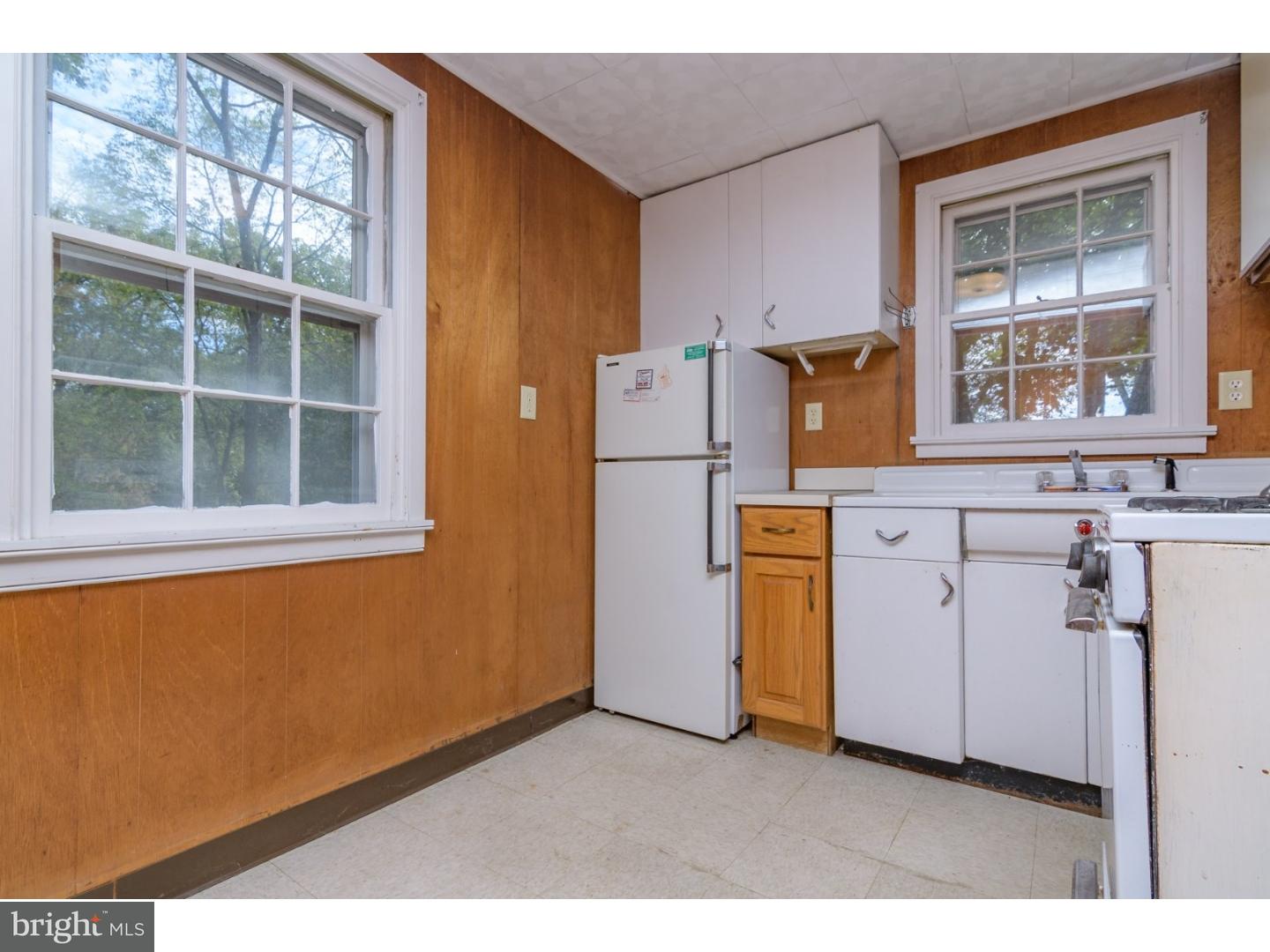 35 State Road Avondale, PA 19311 - Photo 24 of 25 a kitchen with a refrigerator and window