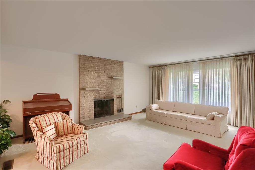 8893 Foxhunt Road Pittsburgh, PA 15237 - Photo 5 of 15 Formal living room with log burning fireplace.