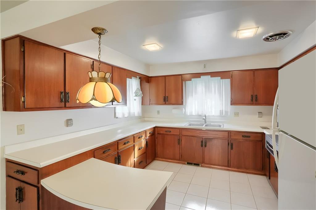8893 Foxhunt Road Pittsburgh, PA 15237 - Photo 7 of 15 Large Kitchen with plenty of room for multiple cooks in the kitchen.