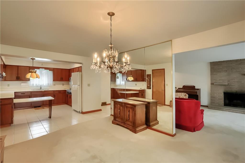 8893 Foxhunt Road Pittsburgh, PA 15237 - Photo 8 of 15 Open concept living ooom, dining room and kitchen.