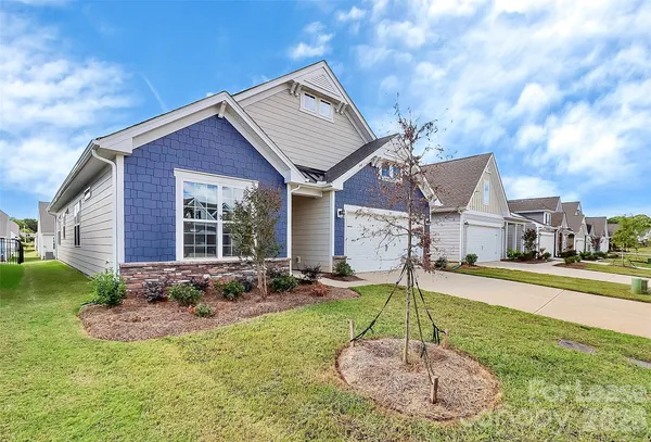 a house view with a garden space